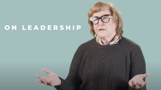 Maura O'Neill speaking - text "On Leadership" on screen