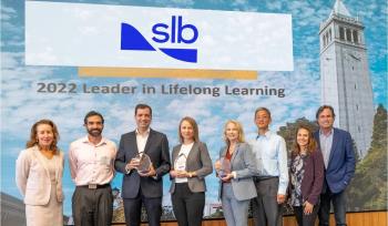 SLB leaders holding award