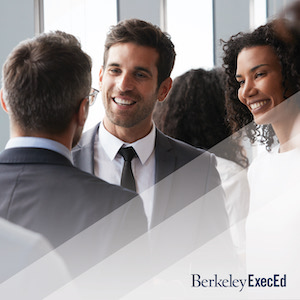 three business people talking