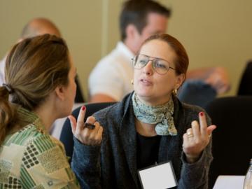 participants talking in classroom