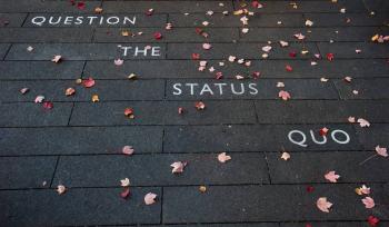 Question the Status Quo engraved on the floor
