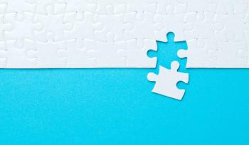 A white puzzle with a missing puzzle piece on a blue background