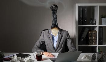 a woman seated at a desk with her head replaced by a burned matchstick