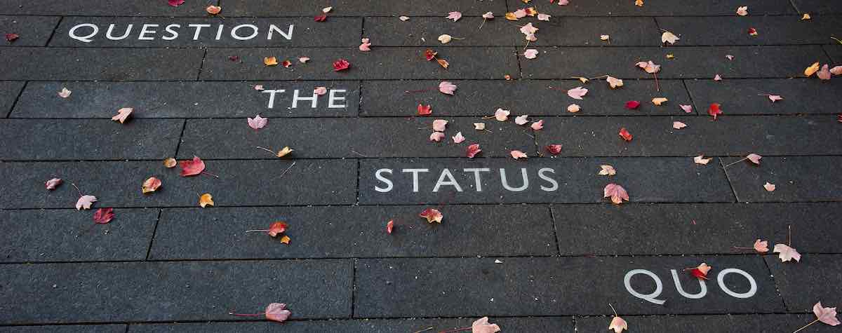 Question the status quo written in the Haas walkways and sprinkled with leaves